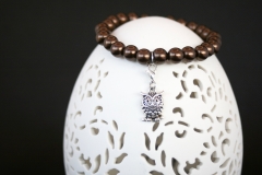 Perlenarmband mit Eulenanhänger