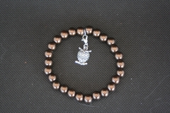 Perlenarmband mit Eulenanhänger